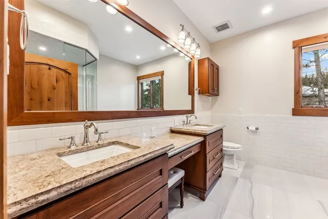 a bathroom with a tub and shower