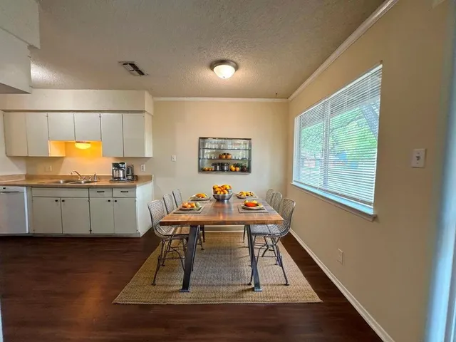 a living room with a wooden floor