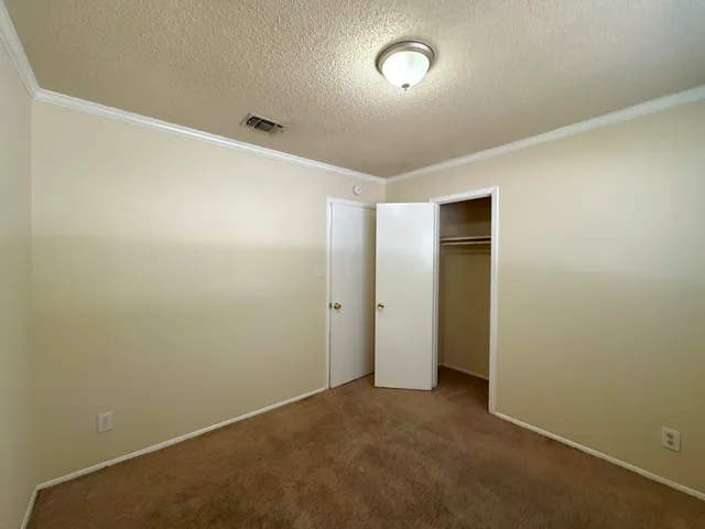 an empty room with an entryway
