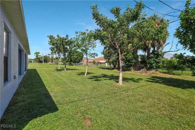 a view of a backyard with green space