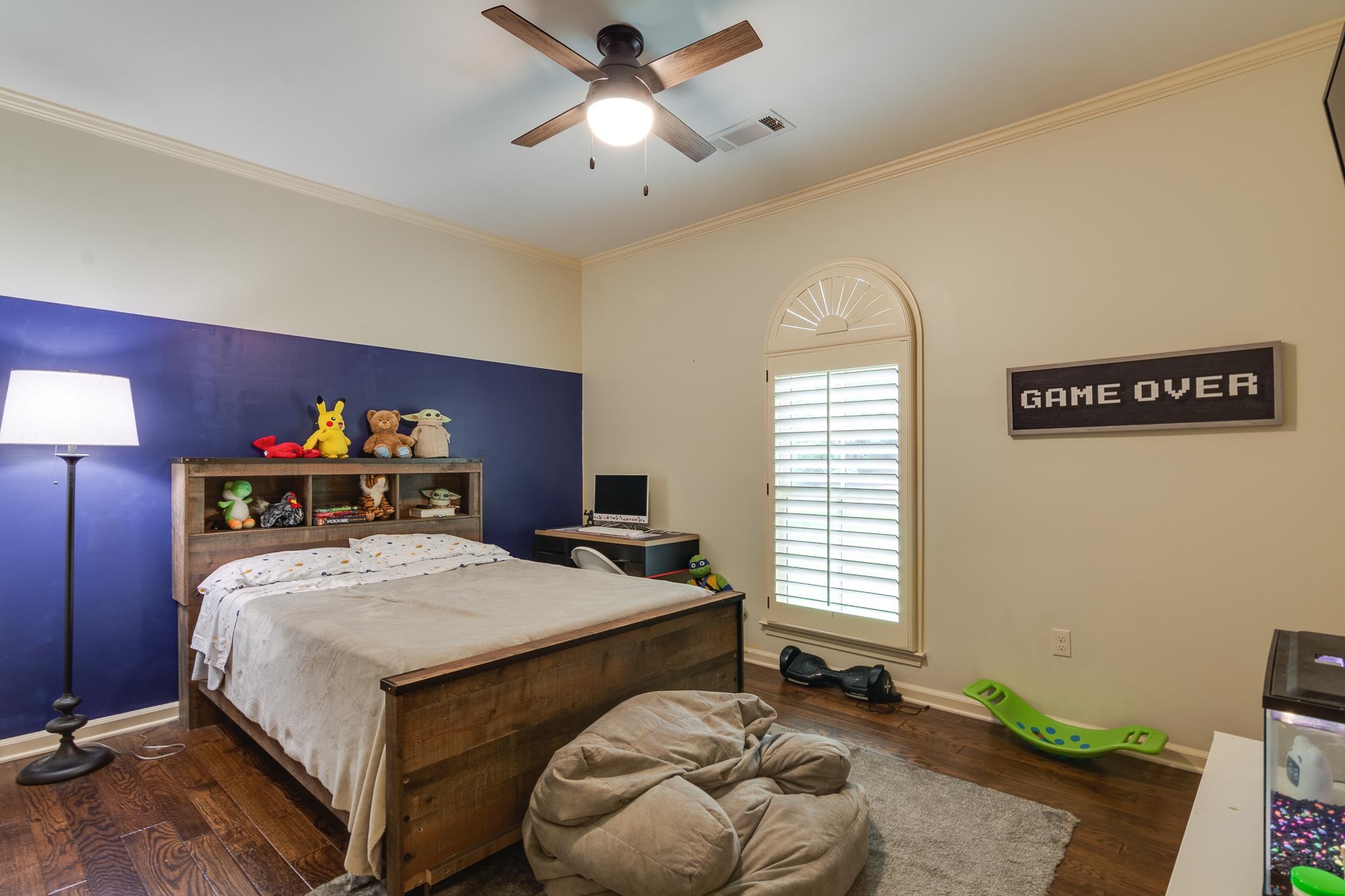 791 North Tree Drive Collierville, TN 38017 - Photo 18 of 27 Bedroom featuring wood-finish flooring, a ceiling fan with integrated lighting, and crown molding