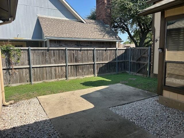 3910 St Christopher Lane Dallas, TX 75287 - Photo 6 of 20 a view of a house with a backyard