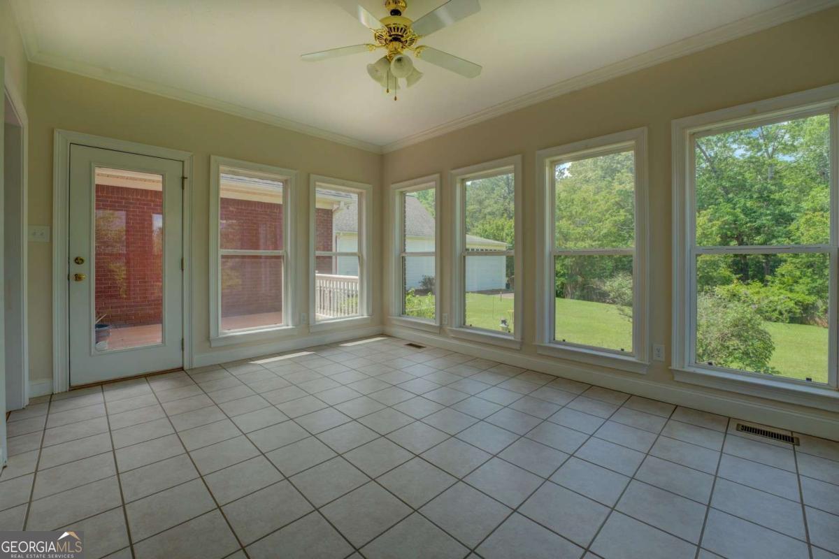 212 Willow Ridge Lane Jackson, GA 30233 - Photo 17 of 45 a view of an empty room with a window