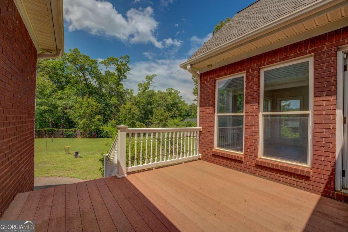 212 Willow Ridge Lane Jackson, GA 30233 - Photo 19 of 45 a view of a house with a backyard