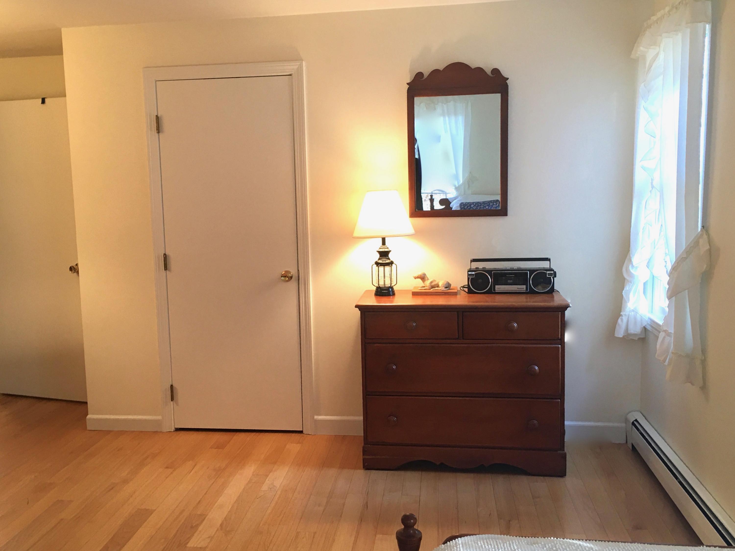 10 Ridgewood Road Orleans, MA 02653 - Photo 19 of 30 a room that has a dresser in it