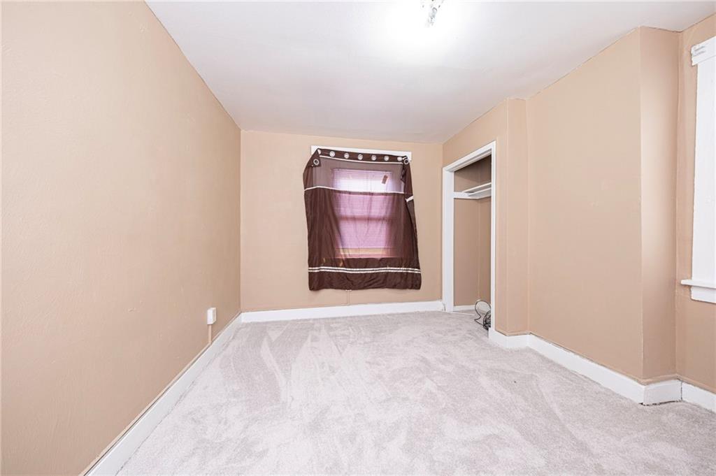 1536 Hunter Street Pittsburgh, PA 15221 - Photo 12 of 18 a view of an empty room with a window