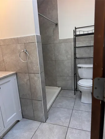 a bathroom with a sink and toilet