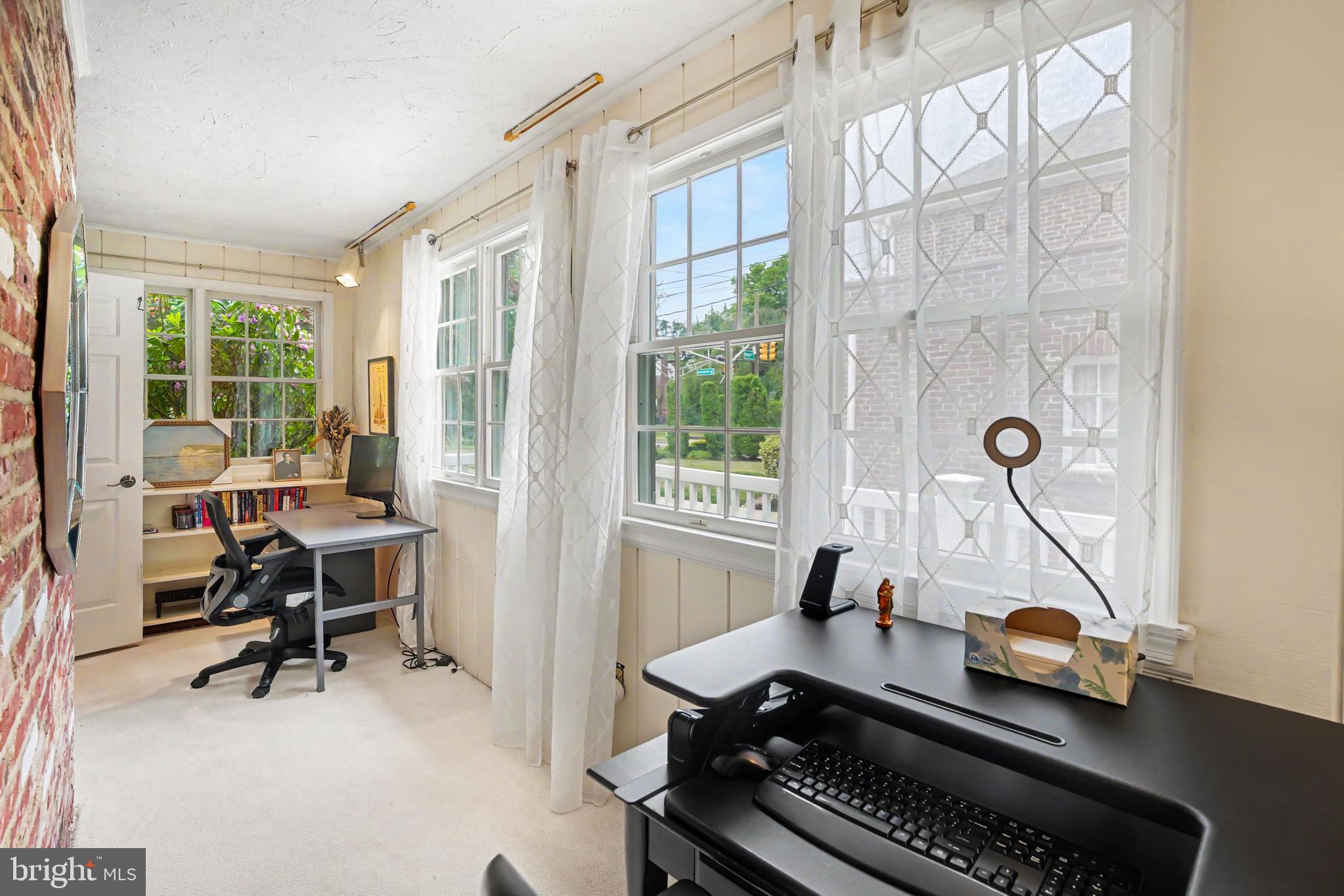 235 Hopkins Road Haddonfield, NJ 08033 - Photo 20 of 47 a view of a workspace with furniture and a window