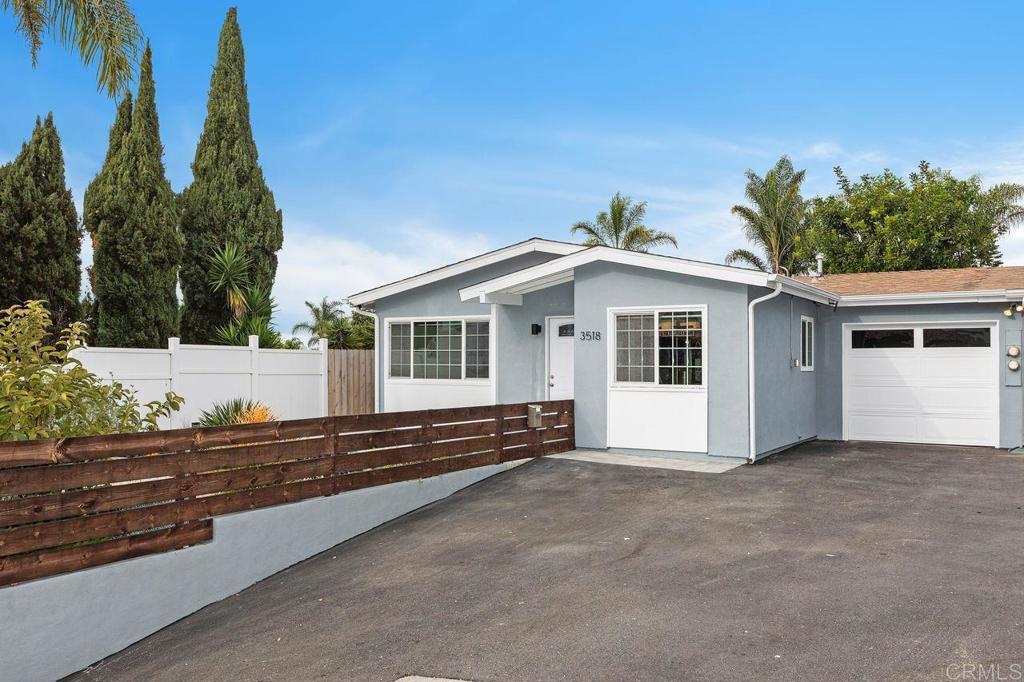 3518 Capalina Road San Marcos, CA 92069 - Photo 2 of 34 a view of a house with a yard
