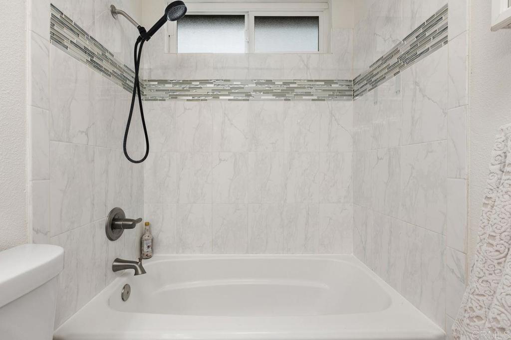 3518 Capalina Road San Marcos, CA 92069 - Photo 23 of 34 a bathroom with a bath tub