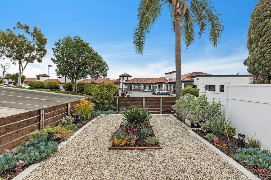 3518 Capalina Road San Marcos, CA 92069 - Photo 6 of 34 a view of a garden with potted plants