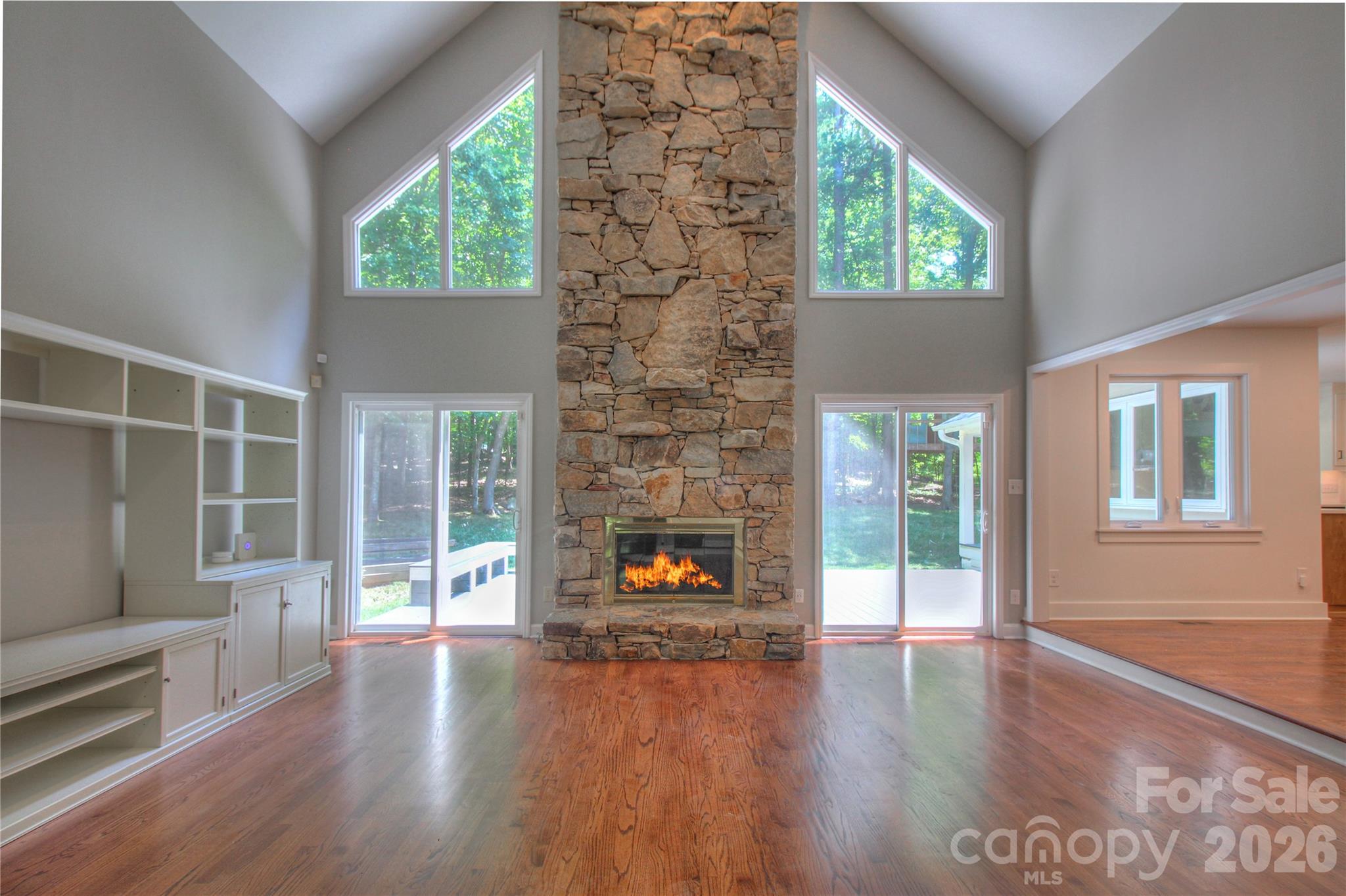 3408 Providence Manor Road Charlotte, NC 28270 - Photo 6 of 39 an empty room with wooden floor and windows