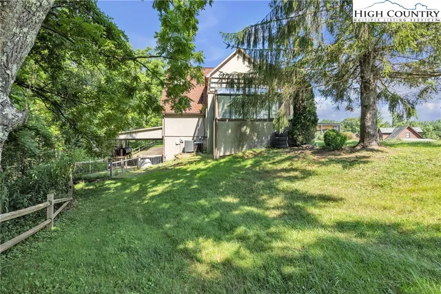 a view of a yard with an ocean