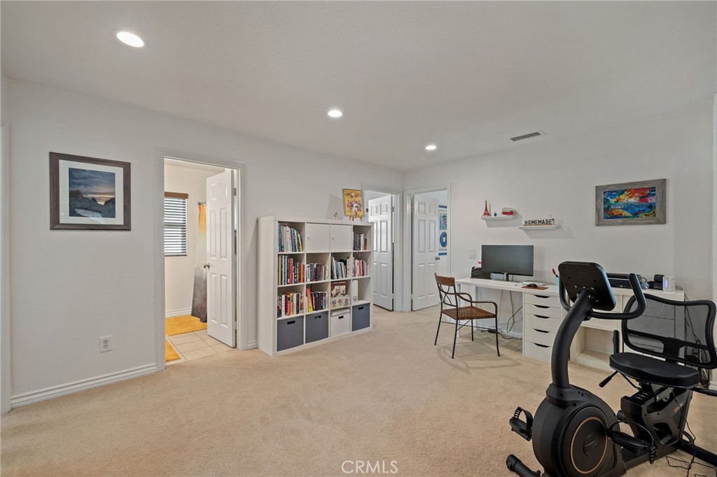 1729 Isabella Way Upland, CA 91784 - Photo 27 of 43 a view of a workspace with furniture and toys