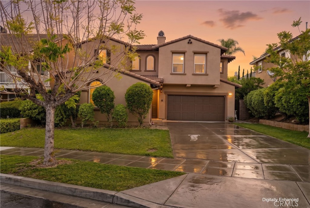 1729 Isabella Way Upland, CA 91784 - Photo 5 of 43 a front view of a house with a yard