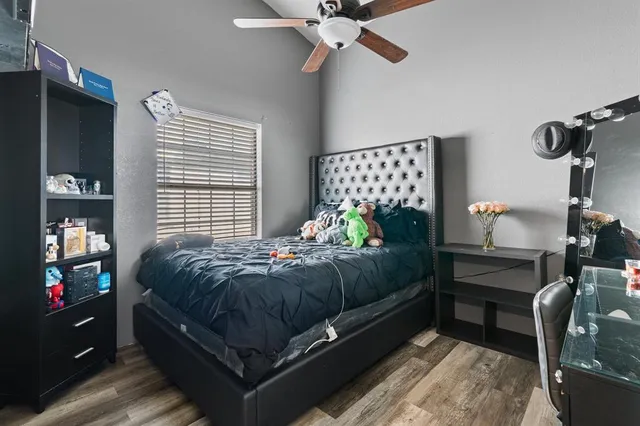 a view of a kitchen with a sink stainless steel appliances and cabinets