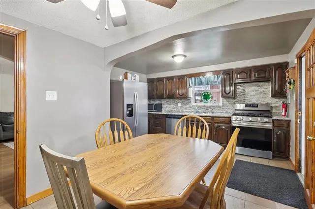 a bedroom with bed and window