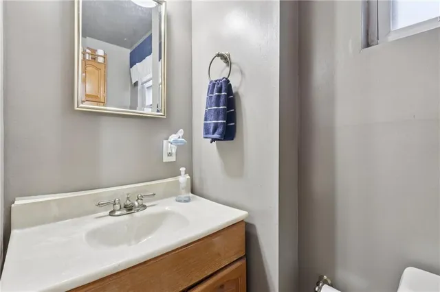 a view of a house with backyard porch and sitting area