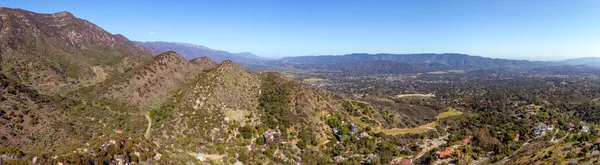 a view of a house with a mountain