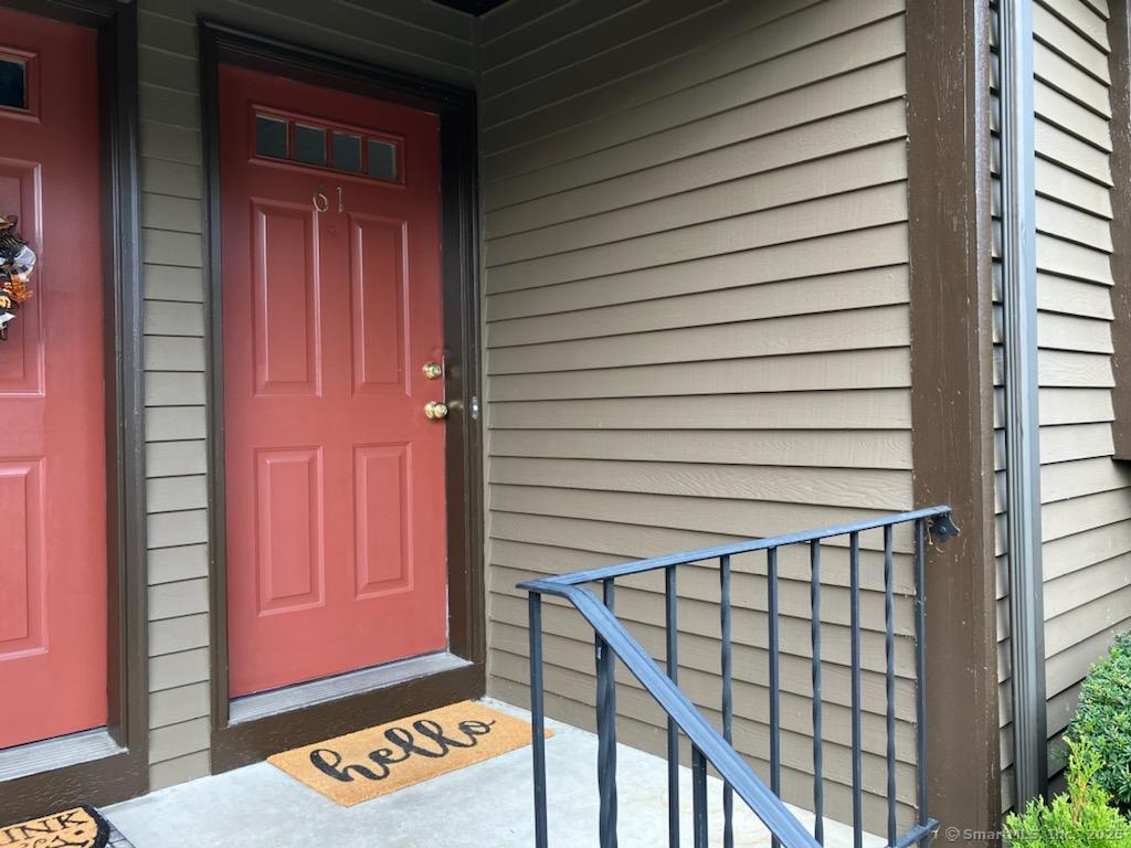 115 Fillow Street, Unit 61 Norwalk, CT 06850 - Photo 11 of 11 a view of front door of a house