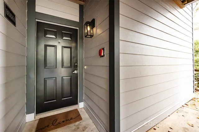 a view of a bedroom from a hallway