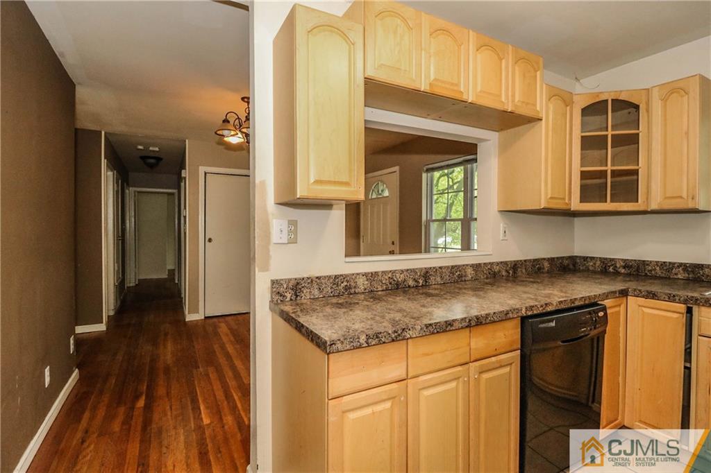 14 Fordham Road Old Bridge, NJ 08859 - Photo 11 of 22 a kitchen with a sink stove and cabinets