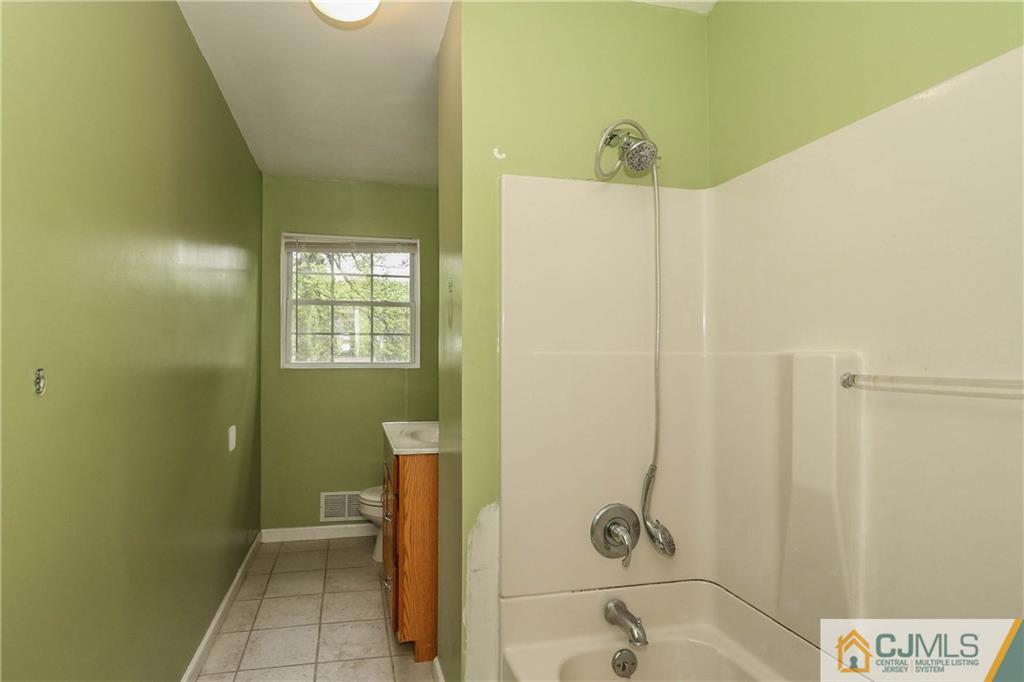 14 Fordham Road Old Bridge, NJ 08859 - Photo 17 of 22 a bathroom with a shower