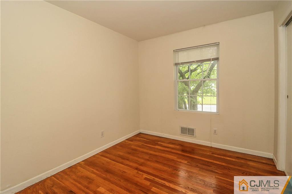 14 Fordham Road Old Bridge, NJ 08859 - Photo 18 of 22 an empty room with a window