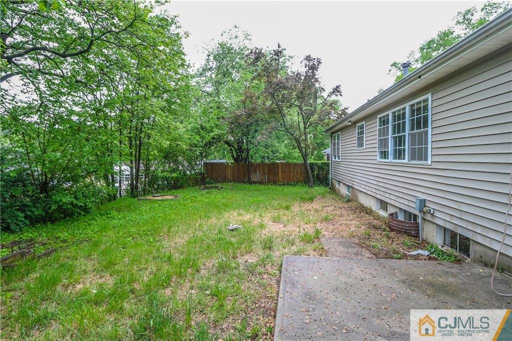 14 Fordham Road Old Bridge, NJ 08859 - Photo 21 of 22 a backyard of a house with lots of green space