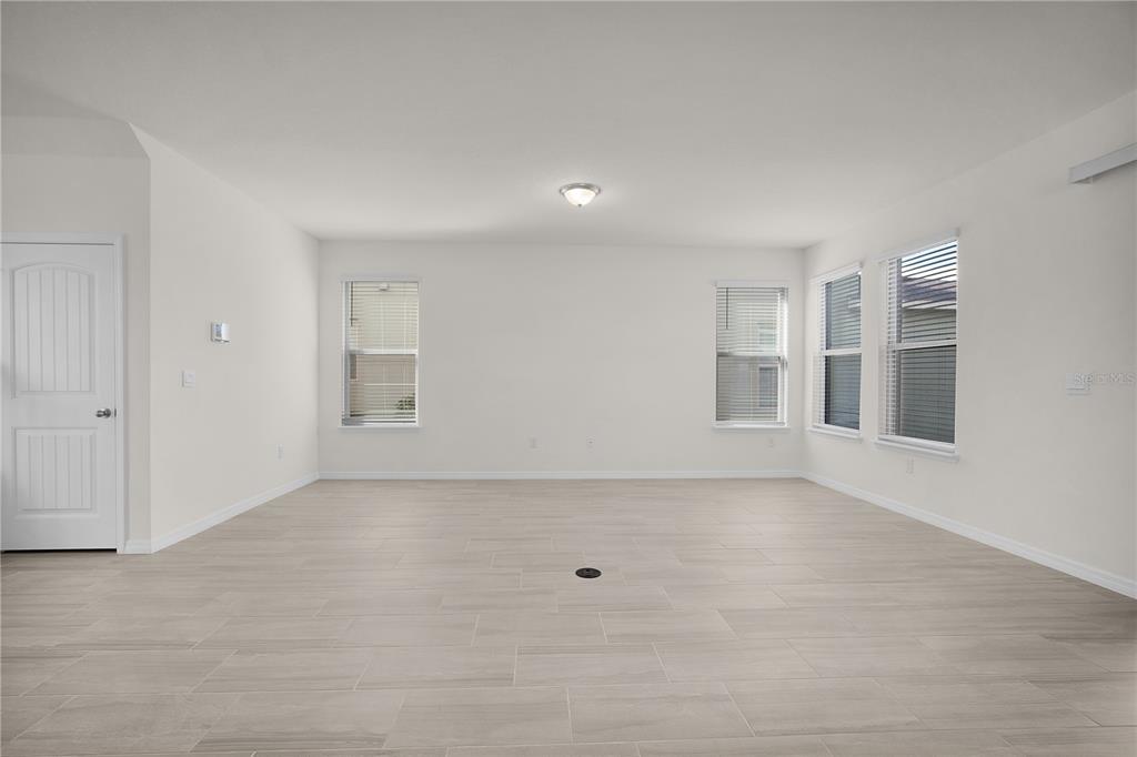 Undisclosed Address Winter Garden, FL 34787 - Photo 12 of 46 a view of an empty room with window