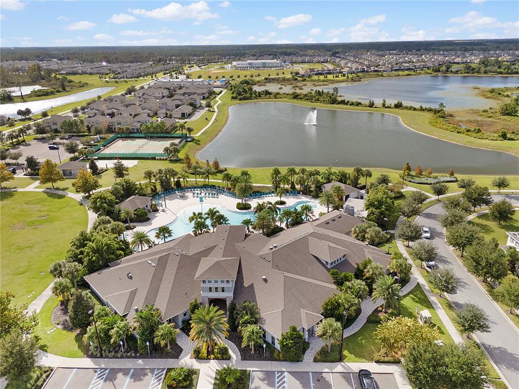 Undisclosed Address Winter Garden, FL 34787 - Photo 42 of 46 an aerial view of residential building and lake view