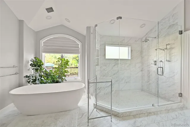 a patio with patio couch and wooden floor