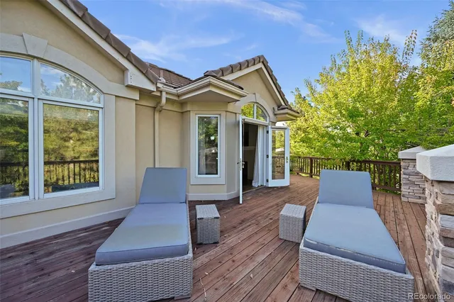 front view of a house with a tree
