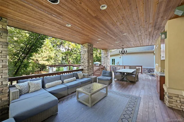 a view of a field of grass and trees