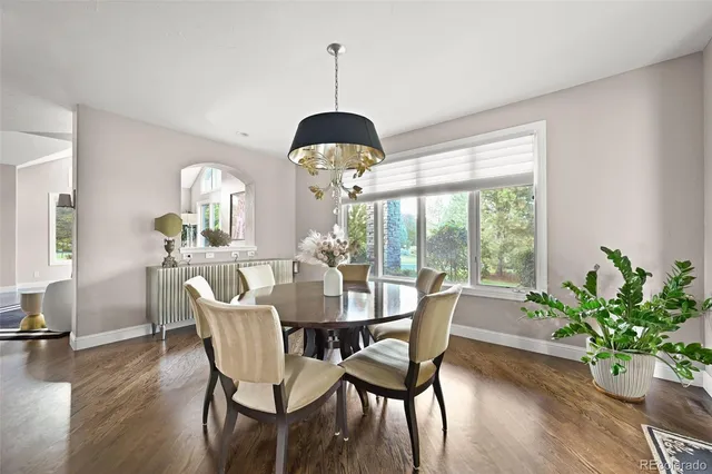 a bed room with a bed and a large window