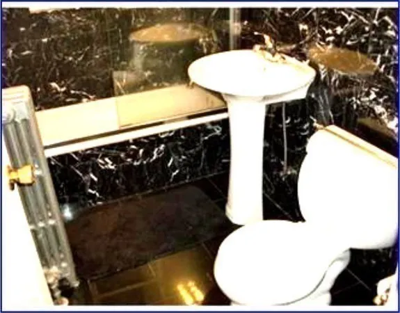 a bathroom with a sink and mirror