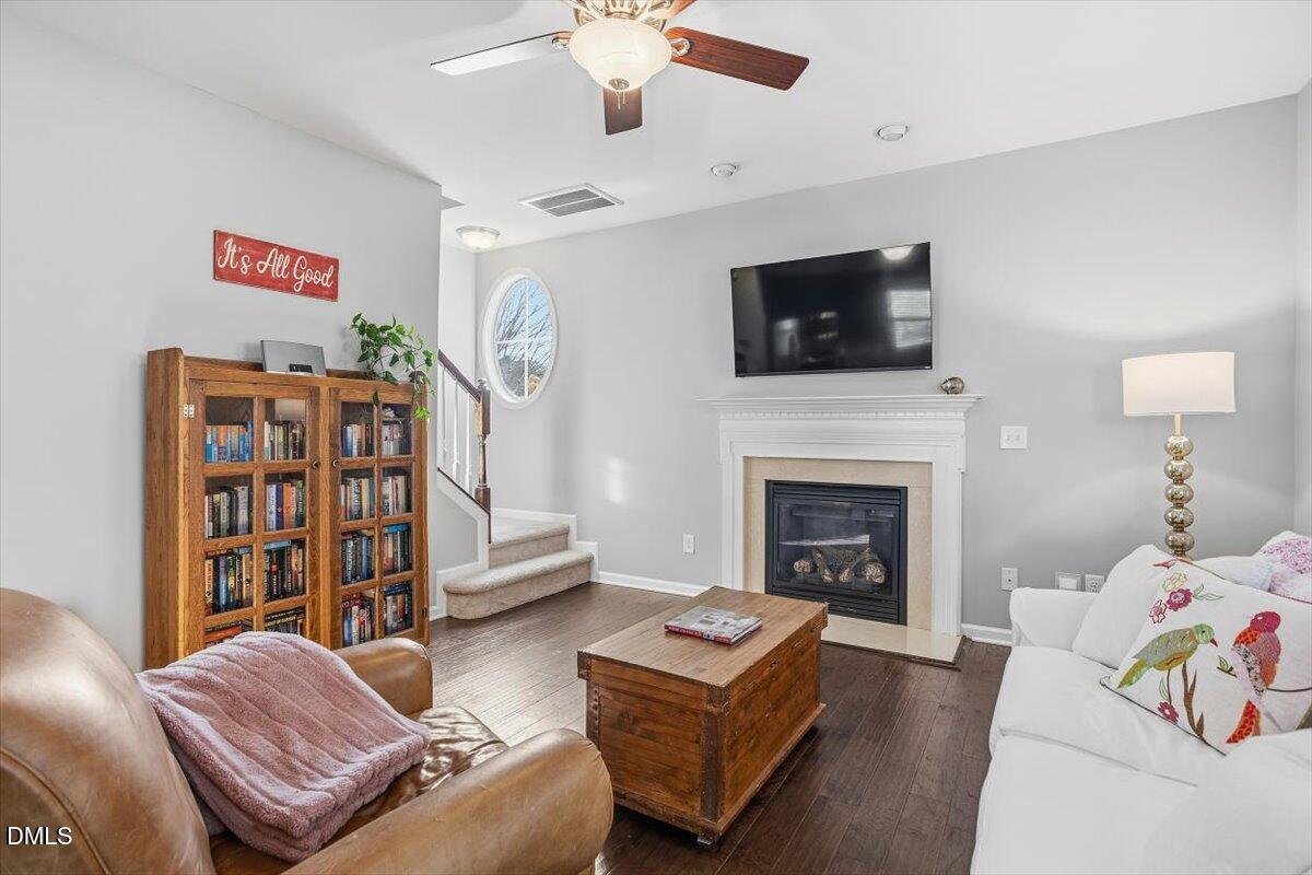 1500 Hemby Ridge Lane Morrisville, NC 27560 - Photo 13 of 50 a living room with furniture and a fireplace