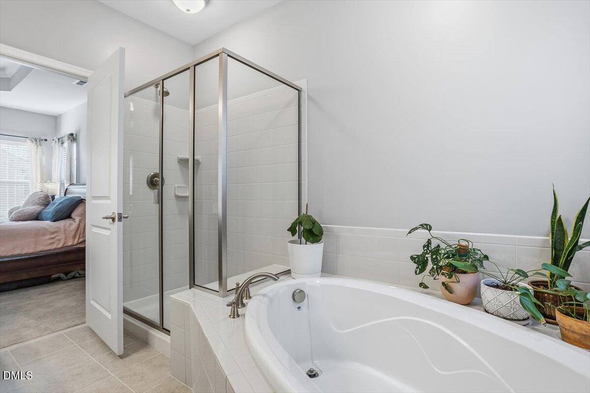 1500 Hemby Ridge Lane Morrisville, NC 27560 - Photo 20 of 50 a white bath tub sitting next to a white tub