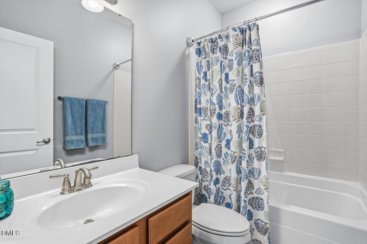 1500 Hemby Ridge Lane Morrisville, NC 27560 - Photo 22 of 50 a bathroom with a sink toilet and shower