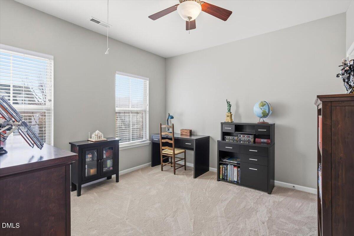 1500 Hemby Ridge Lane Morrisville, NC 27560 - Photo 23 of 50 a workspace with furniture and window