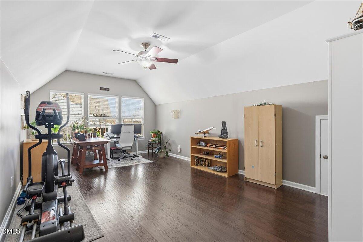 1500 Hemby Ridge Lane Morrisville, NC 27560 - Photo 25 of 50 a view of a livingroom with furniture and a flat screen tv