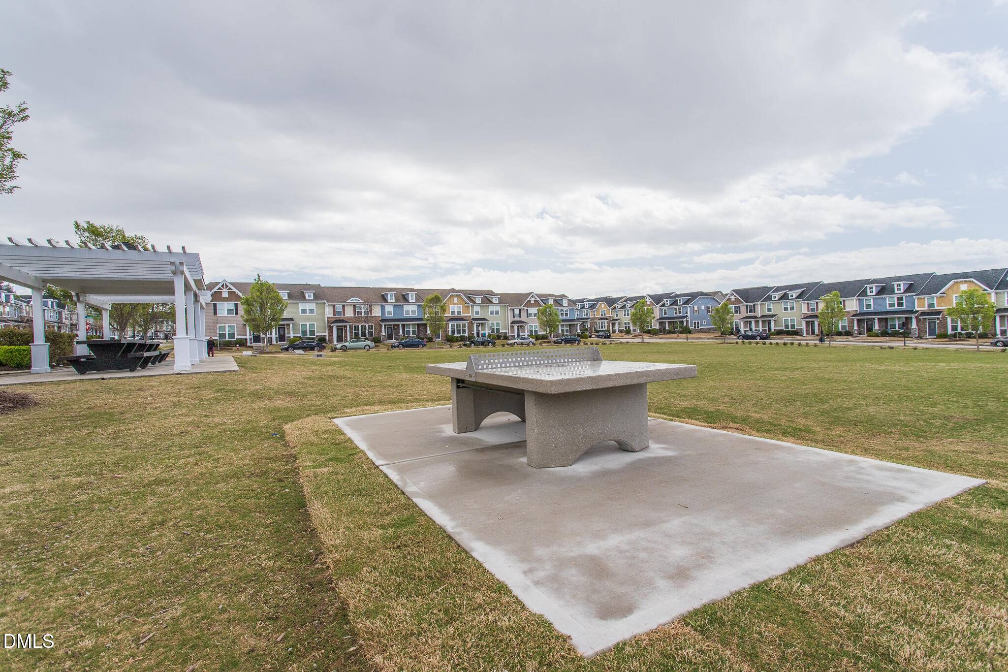 1500 Hemby Ridge Lane Morrisville, NC 27560 - Photo 45 of 50 a view of a swimming pool and an outdoor seating