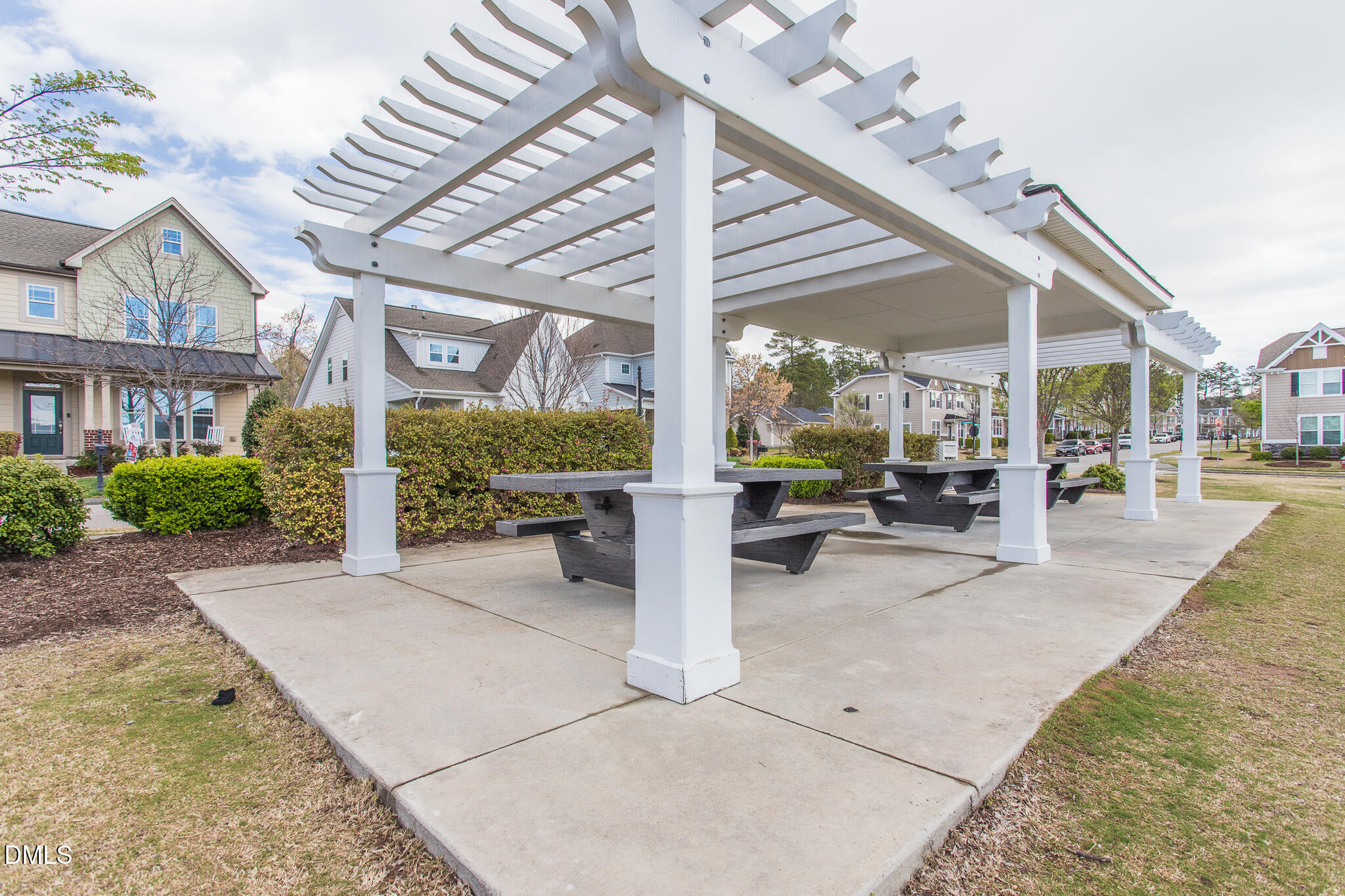 1500 Hemby Ridge Lane Morrisville, NC 27560 - Photo 47 of 50 a view of a patio with a table and chairs under an umbrella
