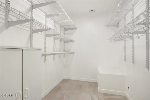 a view of small space with racks on the wall