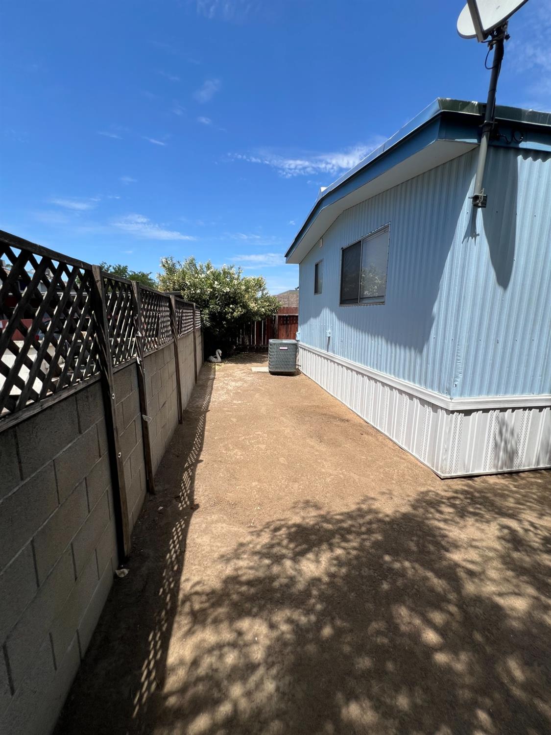 2110 Helm Avenue, Unit 48 Clovis, CA 93612 - Photo 3 of 9 a view of a backyard