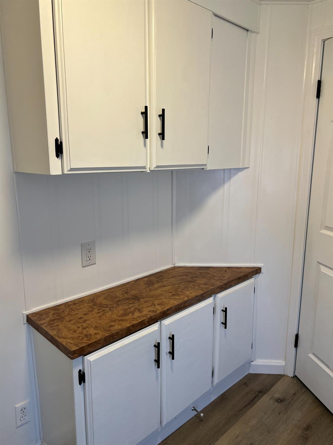 2110 Helm Avenue, Unit 48 Clovis, CA 93612 - Photo 7 of 9 a kitchen with granite countertop white cabinets and white appliances