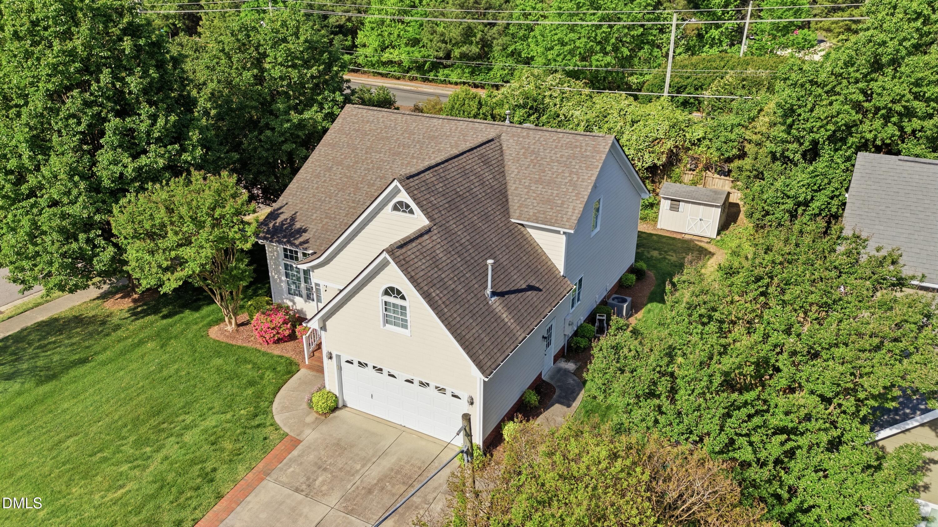 6801 Lynnoak Drive Raleigh, NC 27613 - Photo 28 of 30 an aerial view of a house with a yard