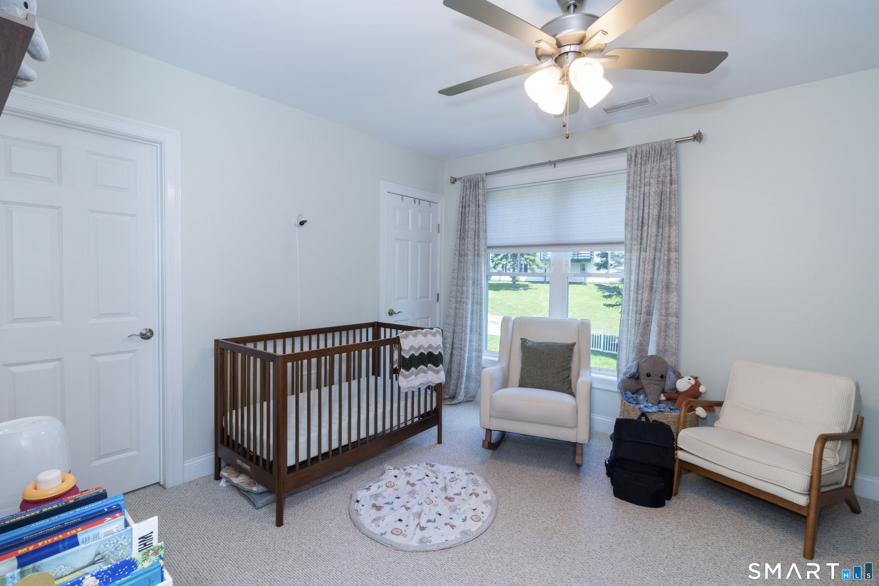656 Bartholomew Road, Unit 656 Middletown, CT 06457 - Photo 20 of 27 a bedroom with a bed and a couch