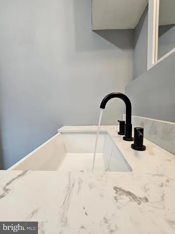 a close view of a sink in a bathroom