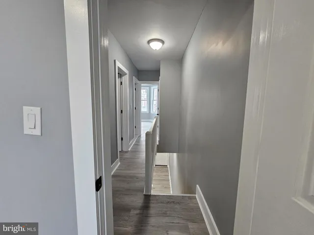a view of hallway with stairs